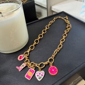 Charming Gold Necklace with Pink Accents